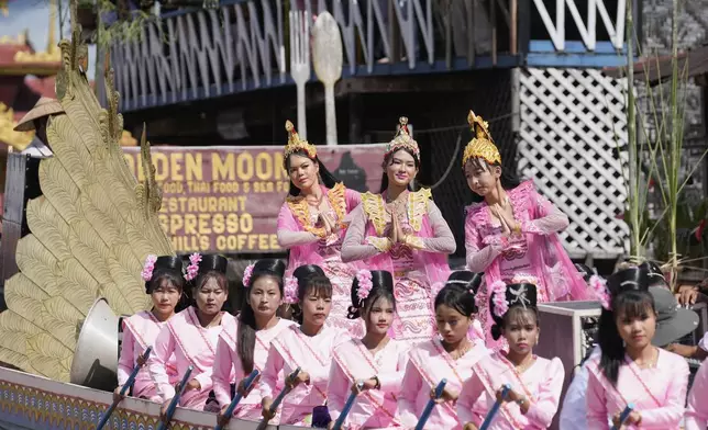 An Ethnic Intha troupe performs during the Phaung Daw Oo pagoda festival in Inle Lake, southern Shan State, Myanmar, Tuesday, Sept. 23, 2025. (AP Photo/Thein Zaw)