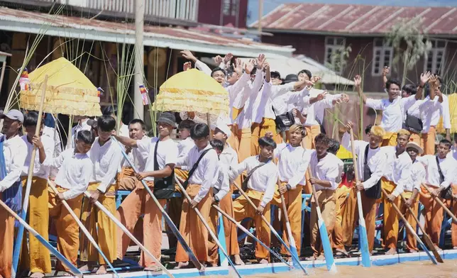 Ethnic Intha people perform during the Phaung Daw Oo pagoda festival in Inle Lake, southern Shan State, Myanmar, Tuesday, Sept. 23, 2025. (AP Photo/Thein Zaw)