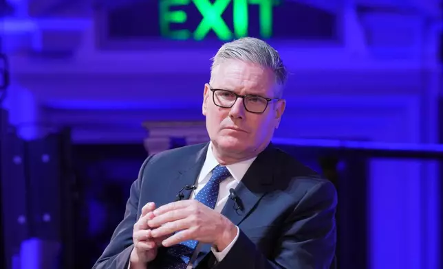 Britain's Prime Minister Keir Starmer listens during a pannel discussion at the Progress Global Action Summit, in London, Friday, Sept. 26, 2025. (AP Photo/Kin Cheung)