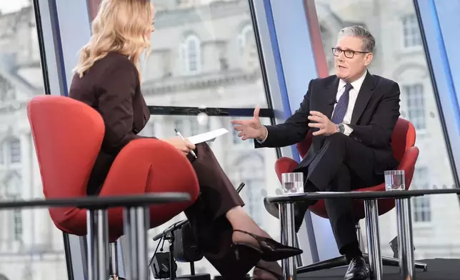British Prime Minister Keir Starmer speaks on the BBC 1 current affairs programme, Sunday, Sept. 28, 2025, with Laura Kuenssberg in Liverpool. (Stefan Rousseau/Pool via AP)