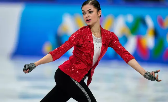 Adeliia Petrosian of Russia, competing as a neutral athlete, performs during the Women short program at the ISU Skate to Milano figure skating qualifier 2025, in Beijing, China, Friday, Sept. 19, 2025. (AP Photo/Mahesh Kumar A.)