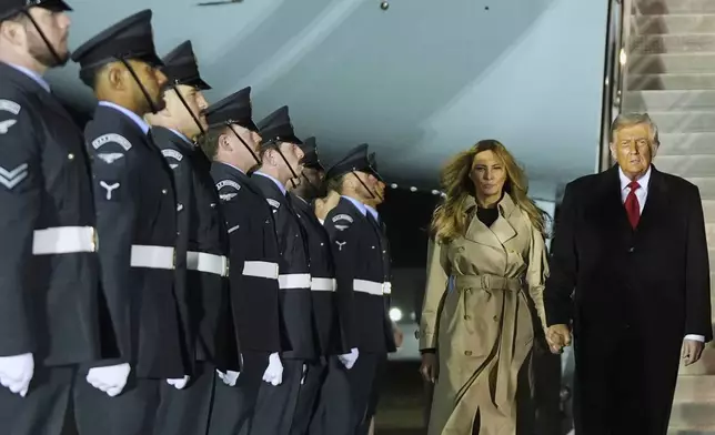 President Donald Trump and first lady Melania Trump arrive at Stansted Airport near London, Tuesday, Sept. 16, 2025. (AP Photo/Evan Vucci)