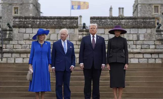 From left, Britain's Queen Camilla, Britain's King Charles III, U.S. President Donald Trump and First Lady Melania Trump arrive for the Beating Retreat military ceremony at Windsor Castle, England, on Wednesday Sept. 17, 2025, day one of the president's second state visit to the UK. (Andrew Matthews/PA via AP, Pool)