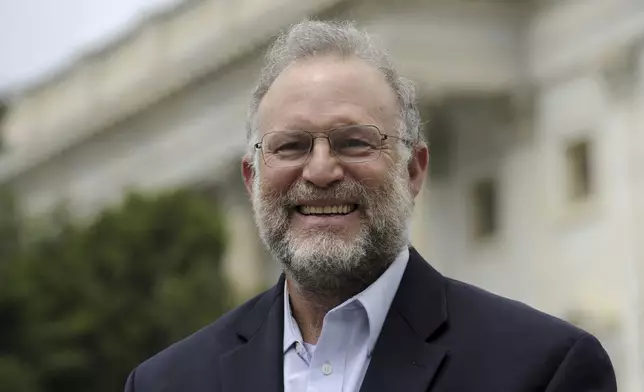 FILE - Ben &amp; Jerry's co-founder Jerry Greenfield speaks on Capitol Hill in Washington, Thursday, July 10, 2014, about a House proposal that would deny Americans the right to know about the genetically engineered ingredients in their food during a news conference. (AP Photo/Susan Walsh, File)