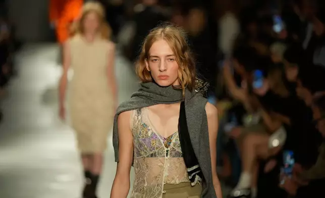 A model wears a creation part of the N21 women's Spring-Summer 2026 collection, that was presented in Milan, Italy, Wednesday, Sept. 24, 2025. (AP Photo/Luca Bruno).