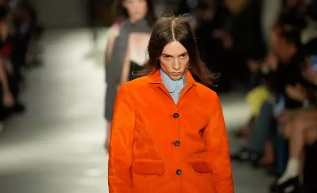 A model wears a creation part of the N21 women's Spring-Summer 2026 collection, that was presented in Milan, Italy, Wednesday, Sept. 24, 2025. (AP Photo/Luca Bruno).