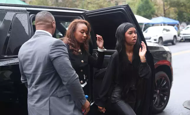The daughters of Sean "Diddy" Combs arrive outside Manhattan federal court for his hearing, Thursday, Sept. 25, 2025, in New York. (AP Photo/Heather Khalifa)