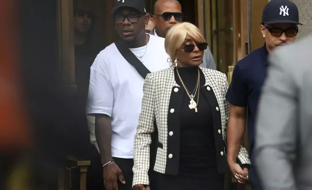 Janice Combs, center, exits Manhattan federal court after a hearing for her son, Sean "Diddy" Combs, Thursday, Sept. 25, 2025, in New York. (AP Photo/Heather Khalifa)