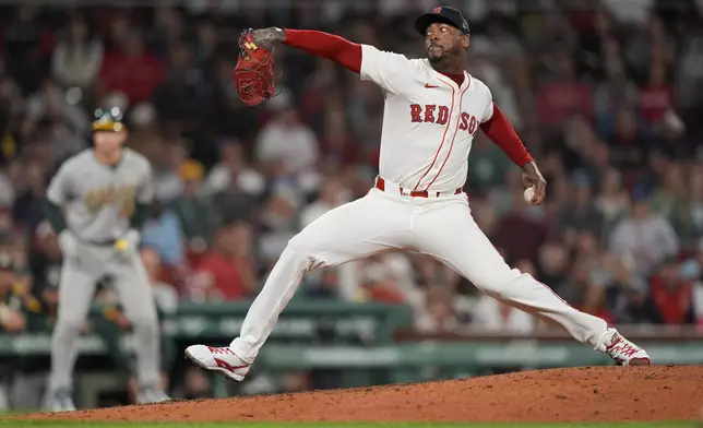 Boston Red Sox pitcher Aroldis Chapman delivers in the ninth inning of a baseball game against the Athletics, Wednesday, Sept. 17, 2025, in Boston. (AP Photo/Robert F. Bukaty)