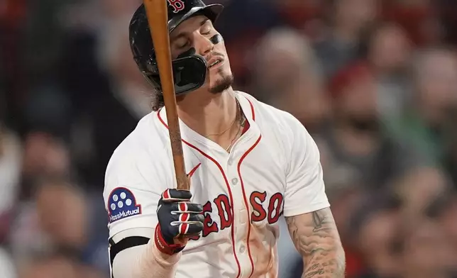 Boston Red Sox Jarren Duran reacts after popping out in the eighth inning against the Athletics in a baseball game, Wednesday, Sept. 17, 2025, in Boston. (AP Photo/Robert F. Bukaty)