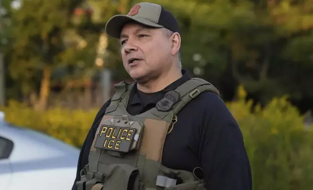 Acting Executive Associate Director of Enforcement and Removal Operations Marcos Charles is shown during a U.S. Immigration and Customs Enforcement operation in Park Ridge, Ill., Friday, Sept. 19, 2025. (AP Photo/Erin Hooley)
