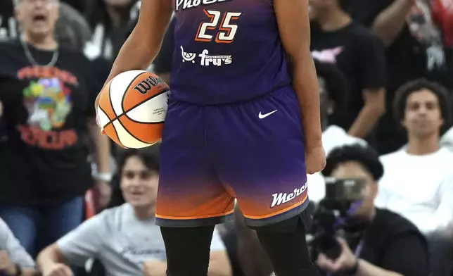 Phoenix Mercury forward Alyssa Thomas celebrates after defeating the New York Liberty in Game 3 in the first round of the WNBA basketball playoffs, Friday, Sept. 19, 2025, in Phoenix. (AP Photo/Rick Scuteri)