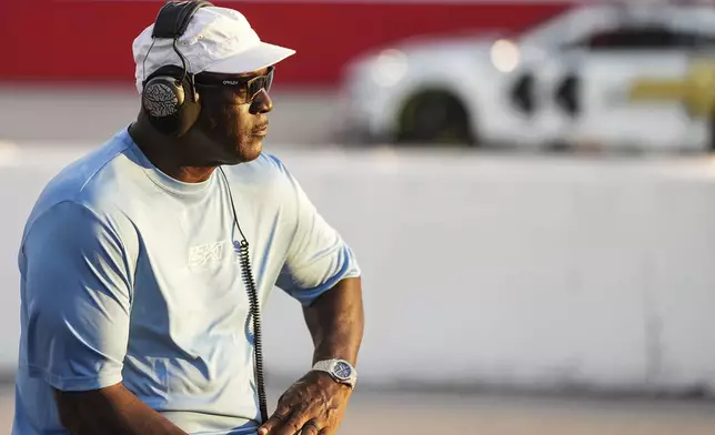 Team owner Michael Jordan looks on during a NASCAR Cup Series auto race at Darlington Raceway, Sunday, Aug. 31, 2025, in Darlington, S.C. (AP Photo/Matt Kelley)