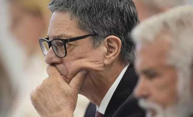 Committee member, Dr. James Pagano listens during a meeting of the Advisory Committee on Immunization Practices at the CDC on Thursday, Sept. 18, 2025, in Chamblee, Ga. (AP Photo/Brynn Anderson)