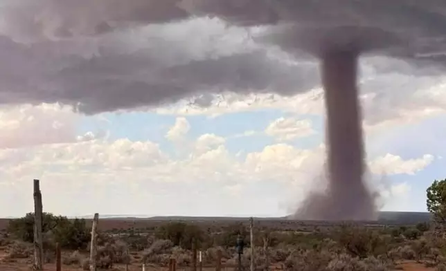 In this photo released by the Navajo Police Department, a tornado funnel is seen Sat., Sept. 13, 2025, northeast of Montezuma Creek, Utah. (Navajo Police Department via AP)