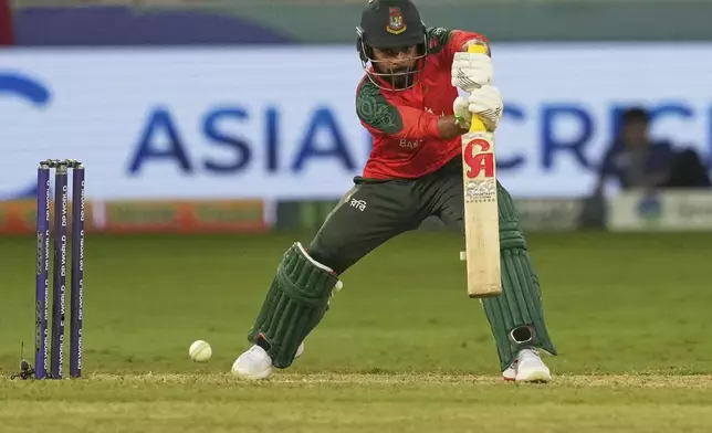 Bangladesh's Towhid Hridoy plays a shot during the Asia Cup cricket match between Bangladesh and Sri Lanka at Dubai International Cricket Stadium in Dubai, United Arab Emirates, Saturday, Sept. 20, 2025. (AP Photo/Altaf Qadri)