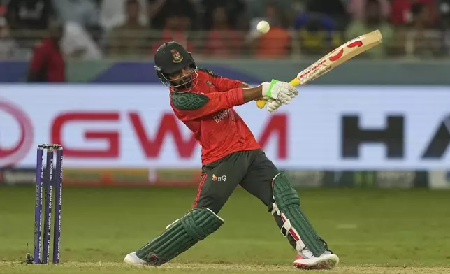 Bangladesh's Towhid Hridoy plays a shot during the Asia Cup cricket match between Bangladesh and Sri Lanka at Dubai International Cricket Stadium in Dubai, United Arab Emirates, Saturday, Sept. 20, 2025. (AP Photo/Altaf Qadri)