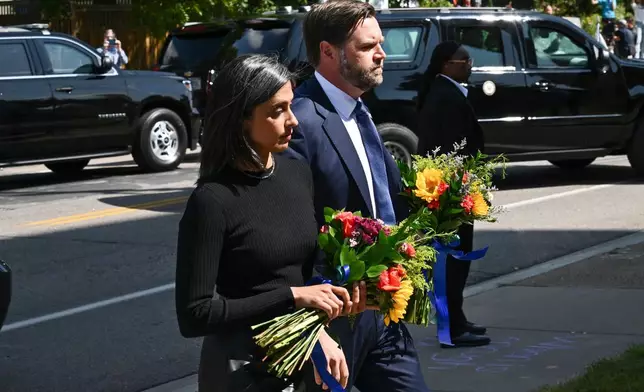Vice President JD Vance and his wife second lady Usha Vance, arrive to pay their respects to victims of the Annunciation Catholic Church shooting in Minneapolis, Minn., Wednesday, Sept. 3, 2025. (Alex Wroblewski/ Pool via AP)