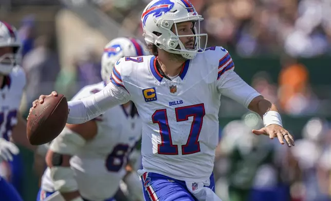 Buffalo Bills quarterback Josh Allen (17) looks to pass against the New York Jets during the first quarter of an NFL football game, Sunday, Sept. 14, 2025, in East Rutherford, N.J. (AP Photo/Frank Franklin)