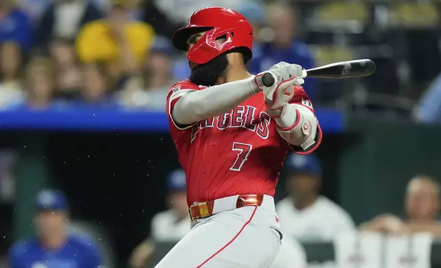 Los Angeles Angels' Jo Adell watches his RBI single during the eighth inning of a baseball game against the Kansas City Royals, Wednesday, Sept. 3, 2025, in Kansas City, Mo. (AP Photo/Charlie Riedel)