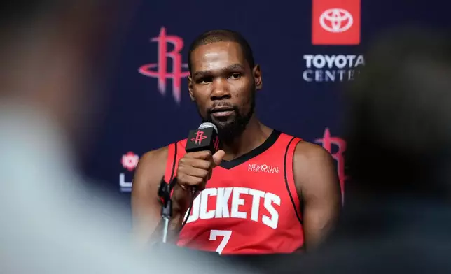 Houston Rockets forward Kevin Durant speaks to reporters during the NBA basketball team's media day in Houston, Monday, Sept. 29, 2025. (AP Photo/Ashley Landis)