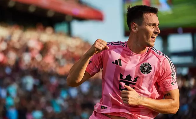Inter Miami's Tadeo Allende (21) celebrates after scoring against Toronto FC during the first half of a MLS soccer game, Saturday, Sept. 27, 2025, in Toronto. (Sammy Kogan/The Canadian Press via AP)