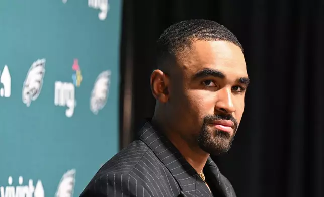 Philadelphia Eagles quarterback Jalen Hurts speaks during a news conference after an NFL football game against the Tampa Bay Buccaneers, Sunday, Sept. 28, 2025, in Tampa, Fla. (AP Photo/Jason Behnken)