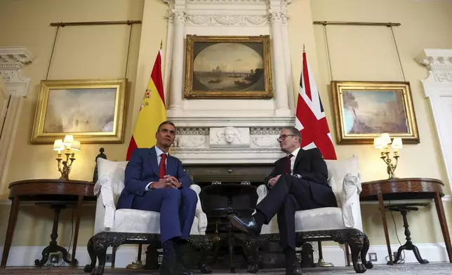 British Prime Minister Keir Starmer, right, and Spanish Prime Minister Pedro Sanchez, hold a meeting inside 10 Downing Street, in London, Wednesday, Sept. 3, 2025. (Toby Melville, Pool Photo via AP)