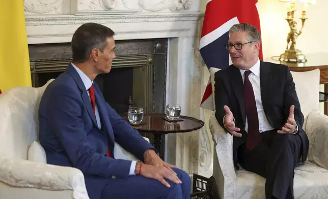 British Prime Minister Keir Starmer, right, and Spanish Prime Minister Pedro Sanchez, hold a meeting inside 10 Downing Street, in London, Wednesday, Sept. 3, 2025. (Toby Melville, Pool Photo via AP)