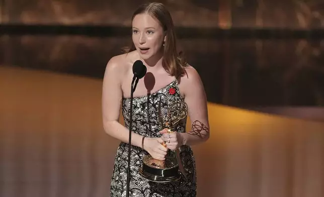 Hannah Einbinder accepts the award for outstanding supporting actress in a comedy series for "Hacks" during the 77th Primetime Emmy Awards on Sunday, Sept. 14, 2025, at the Peacock Theater in Los Angeles. (AP Photo/Chris Pizzello)