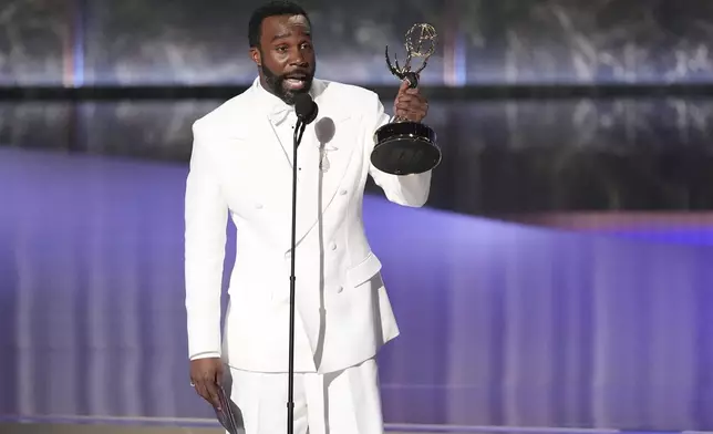 Tramell Tillman accepts the award for outstanding supporting actor in a drama series for "Severance" during the 77th Primetime Emmy Awards on Sunday, Sept. 14, 2025, at the Peacock Theater in Los Angeles. (AP Photo/Chris Pizzello)