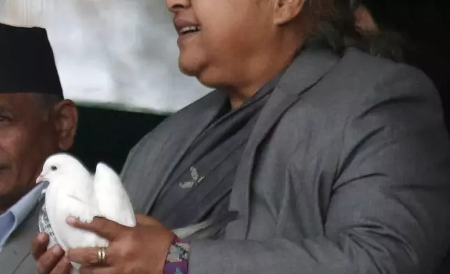 FILE - Chief Justice of the Supreme Court Sushila Karki takes part in celebrations of Democracy Day in Kathmandu, Nepal, Friday, Feb. 18, 2017. (AP Photo/Niranjan Shrestha, File)