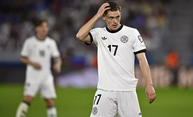 Germany's Florian Wirtz scratches his head during the World Cup Group A qualifying soccer match between Slovakia and Germany in Bratislava, Slovakia, Thursday, Sept. 4, 2025. (AP Photo/Denes Erdos)