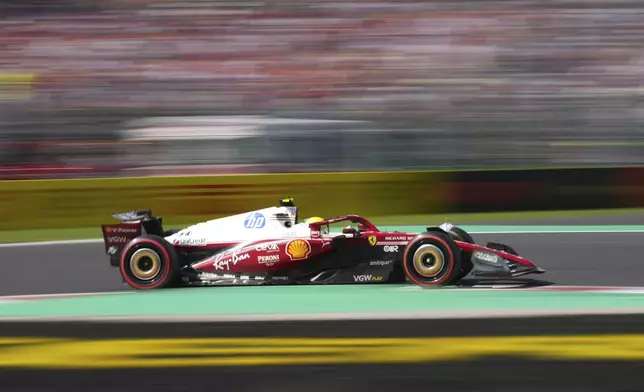 Ferrari driver Lewis Hamilton of Britain steers his car during the first free practice ahead of the Italian Grand Prix at the Monza racetrack in Monza, Italy, Friday, Sept. 5, 2025. (AP Photo/Antonio Calanni)