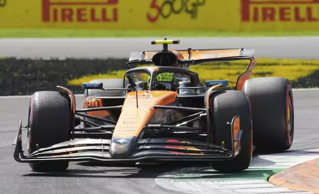McLaren driver Lando Norris of Britain steers his car during the first free practice ahead of the Italian Grand Prix at the Monza racetrack in Monza, Italy, Friday, Sept. 5, 2025. (AP Photo/Antonio Calanni)