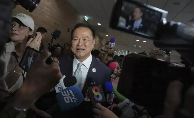 Leader of Bhumjai Thai Party Anutin Charnvirakul leaves after a press conference at Parliament in Bangkok, Thailand, Wednesday, Sept. 3, 2025. (AP Photo/Sakchai Lalit)