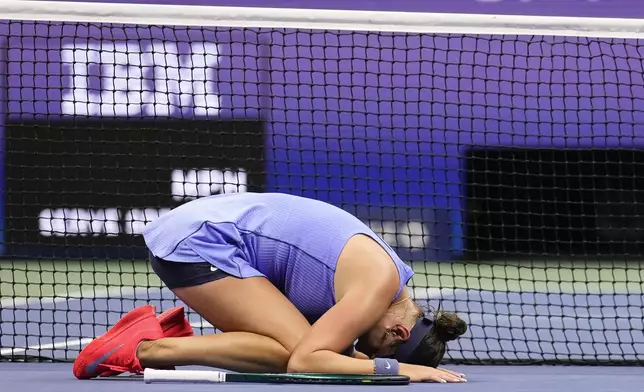 Amanda Anisimova, of the United States,reacts after defeating Naomi Osaka, of Japan, during the women's singles semifinals of the U.S. Open tennis championships, Friday, Sept. 5, 2025, in New York. (AP Photo/Seth Wenig)