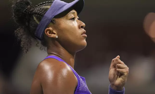 Naomi Osaka, of Japan, reacts after winning a point against Amanda Anisimova, of the United States, during the women's singles semifinals of the U.S. Open tennis championships, Thursday, Sept. 4, 2025, in New York. (AP Photo/Seth Wenig)