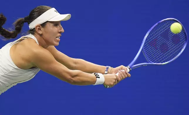 Jessica Pegula, of the United States, returns a shot to Aryna Sabalenka, of Belarus, during the women's singles semifinals of the U.S. Open tennis championships, Thursday, Sept. 4, 2025, in New York. (AP Photo/Seth Wenig)