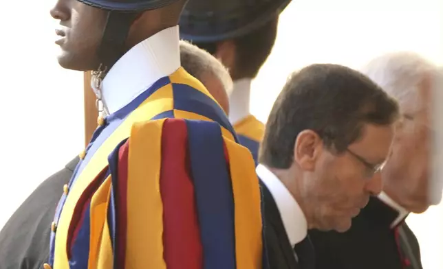 Israel's President Isaac Herzog arrives in the St. Damasus courtyard at The Vatican on his way to a private audience with Pope Leo XIV, Thursday, Sep. 4, 2025. (AP Photo/Domenico Stinellis)