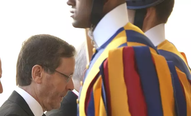Israel's President Isaac Herzog arrives in the St. Damasus courtyard at The Vatican on his way to a private audience with Pope Leo XIV, Thursday, Sep. 4, 2025. (AP Photo/Domenico Stinellis)