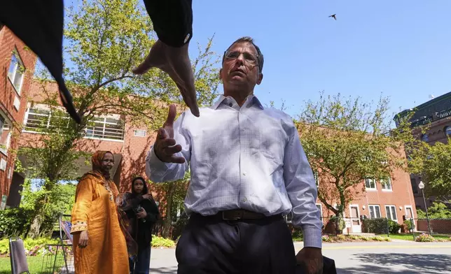 Boston mayoral candidate Josh Kraft campaigns outside a polling place, Tuesday, Sept. 9, 2025, in the Roxbury neighborhood of Boston. (AP Photo/Charles Krupa)