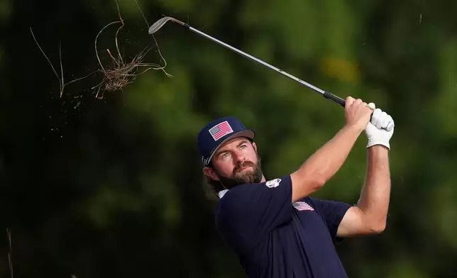 United States' Cameron Young hits from the rough on the 11th hole at Bethpage Black golf course during the Ryder Cup golf tournament, Saturday, Sept. 27, 2025, in Farmingdale, N.Y. (AP Photo/Matt Slocum)