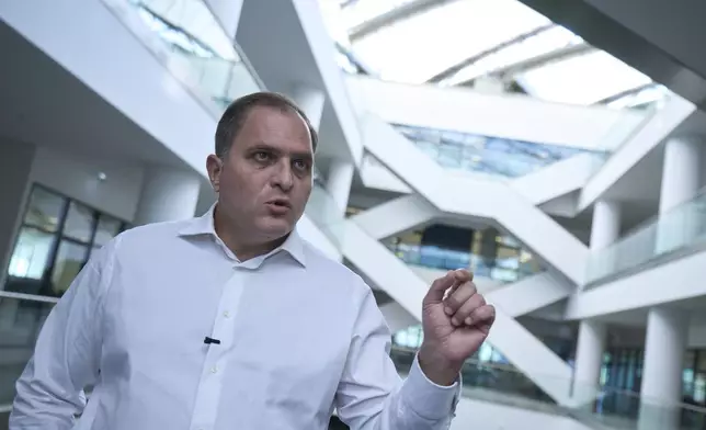 Giorgos Pitsilis, governor of the Independent Authority for Public Revenue (AADE) speaks to the Associated Press in Athens, Greece, Tuesday, Sept. 16, 2025. (AP Photo/Petros Giannakouris)