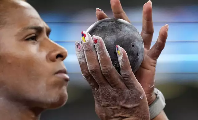 Colombia's Martha Araujo prepares for an attempt in the heptathlon shot put at the World Athletics Championships in Tokyo, Friday, Sept. 19, 2025. (AP Photo/Matthias Schrader)