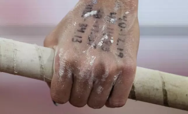 United States' Katie Moon gets ready to compete in the women's pole vault final at the World Athletics Championships in Tokyo, Wednesday, Sept. 17, 2025. (AP Photo/Matthias Schrader)