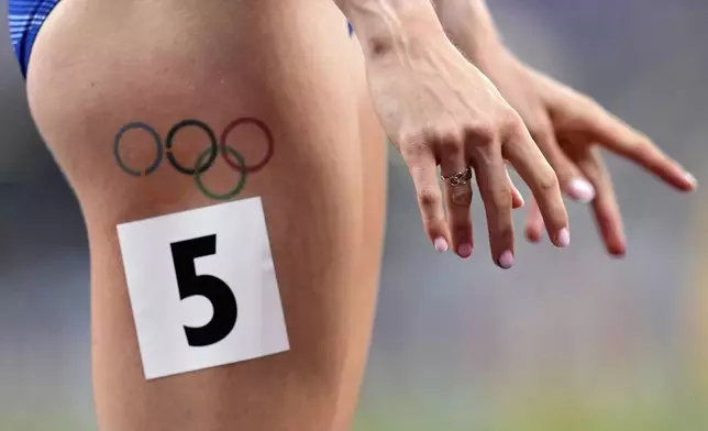 Slovakia's Emma Zapletalova prepares to start a women's 400 meters hurdles semifinal at the World Athletics Championships in Tokyo, Wednesday, Sept. 17, 2025. (AP Photo/Petr David Josek)