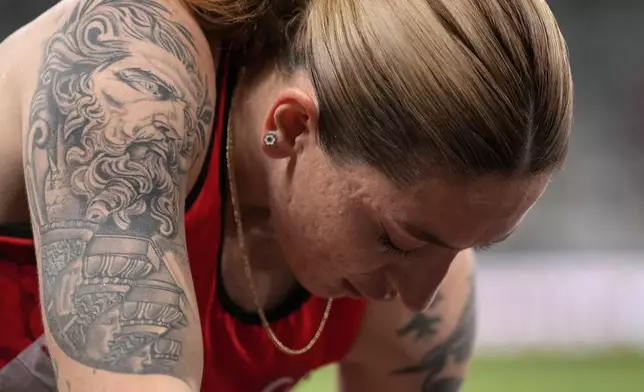Turkey's Tugba Danismaz pauses during the women's triple jump final at the World Athletics Championships in Tokyo, Thursday, Sept. 18, 2025. (AP Photo/Hiro Komae)
