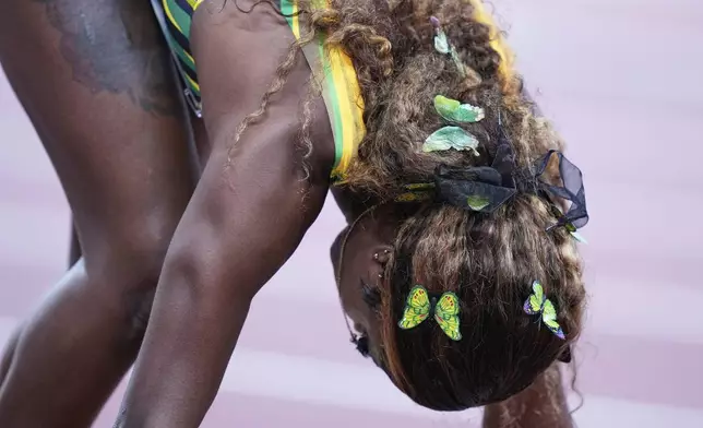 Jamaica's Shiann Salmon prepares to compete in women's 400 meters hurdles semifinal at the World Athletics Championships in Tokyo, Wednesday, Sept. 17, 2025. (AP Photo/Eugene Hoshiko)