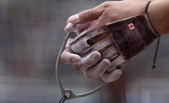 Japan's Shota Fukuda gets ready for an attempt in the men's hammer throw qualification at the World Athletics Championships in Tokyo, Monday, Sept. 15, 2025. (AP Photo/Matthias Schrader)